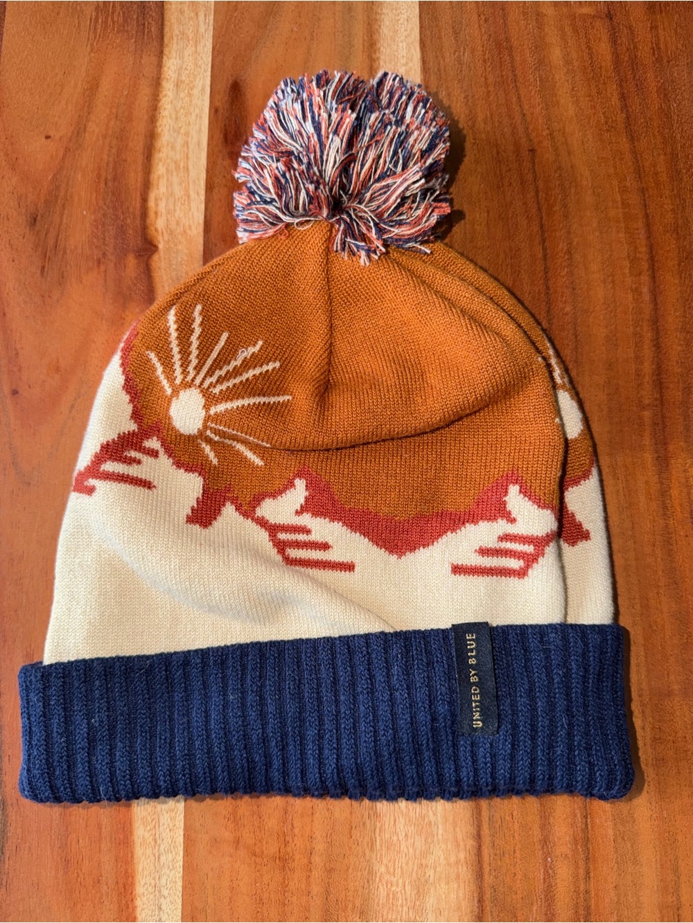 United By Blue Scenic Pom Beanie - Navy, Rust, Cream